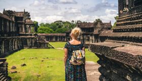 Tourist standing at Angkor Temple, Siem Reap